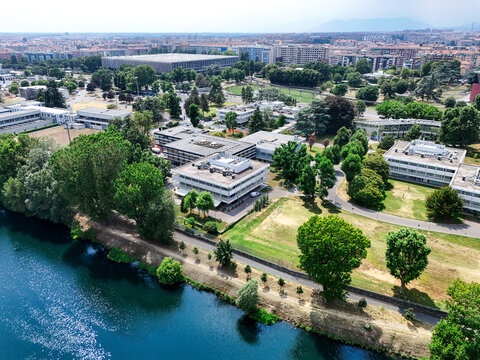 Aerial view of the International Training Centre of the International Labour Organisation campus along the Po River with modern buildings and green lawns in Torino, Piemonte, Italy.