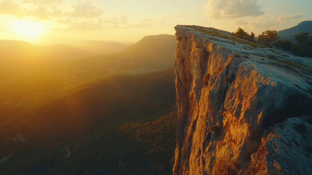 Sunset Over Rugged Cliffside and Mountainic Horizon