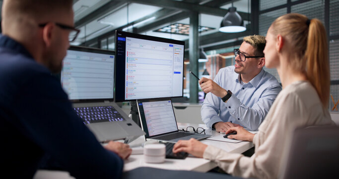 The IT Support Team Works Together Solving Customer Issues