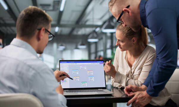Marketing Manager Guides Diverse Team Through Automated Email Campaign