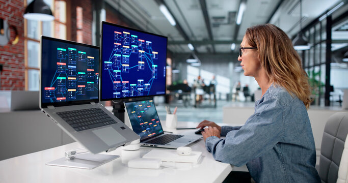 Mature Woman Builds Workflows Using Low Code Platform