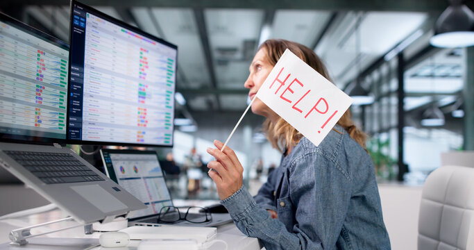 Frustrated Woman Struggles With Overloaded Spreadsheet