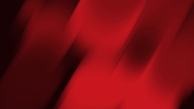 Abstract blur pattern with bright red diagonal light streaks, vivid crimson hues, and dark shadows. Suitable for backgrounds, digital designs, and technology concepts.