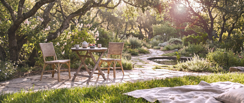 A simple wooden dining table in the garden.