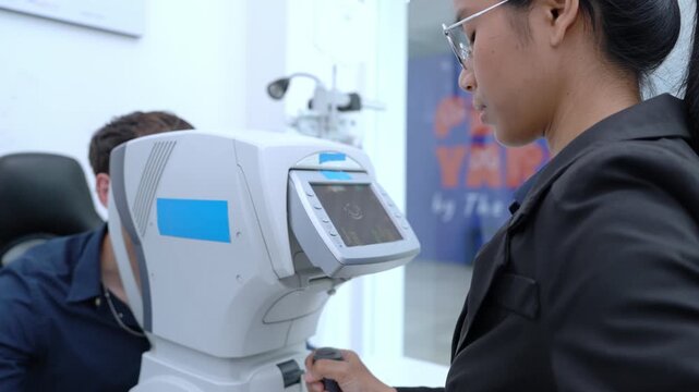 Eye care professional performing a comprehensive eye exam using state of the art technology in a modern clinic environment