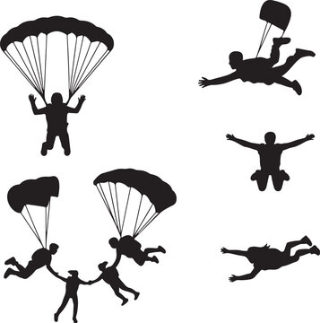 Silhouettes of parachutists and skydivers in action