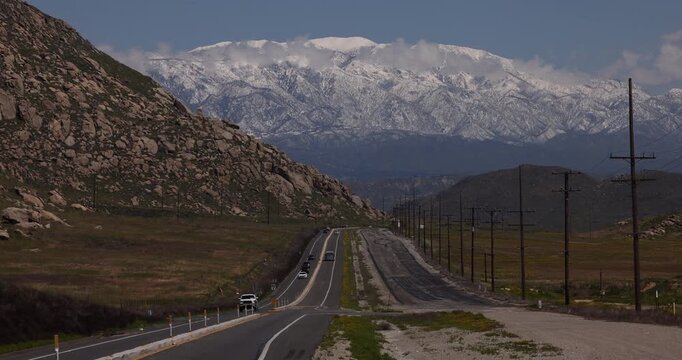 Spring time snow covers the San Gorgonio Mountain peak of the San Bernardino Mountains from Perris, California, USA.