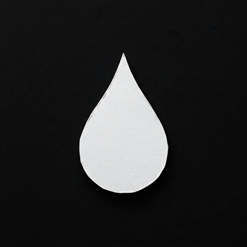 White teardrop shape on solid black background  simple geometric form  basic design element