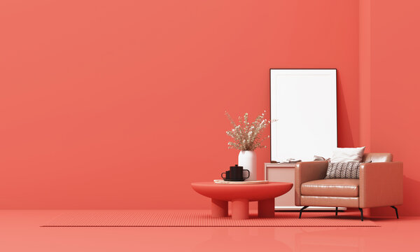 Contemporary coral red living room with a leather armchair, coffee table, blank wall frame and spacious copy space. 3d rendering.