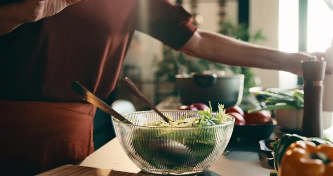 Cooking, salad and hands with utensils in kitchen, nutrition and meal prep with ingredients and oil. Dressing, food and person with culinary skills for gourmet, vegetarian and organic diet in home