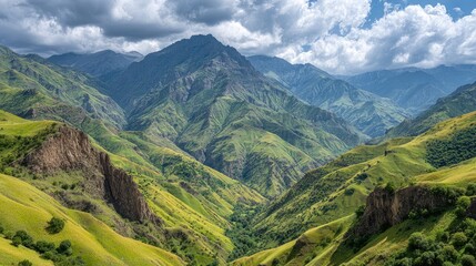 Fototapeta premium Majestic Green Mountain Landscape with Dramatic Clouds and Lush Valleys Under Vibrant Blue Sky in Stunning Natural Setting