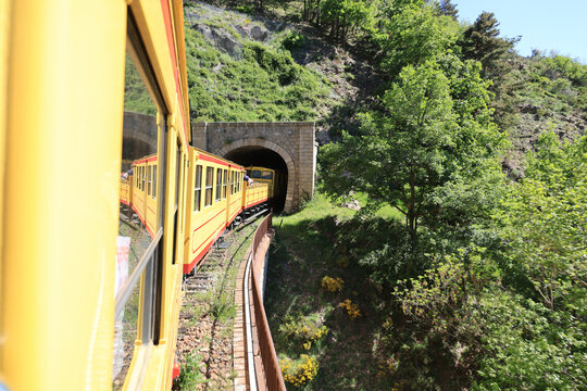 Train journey on the Yellow Train or-Canary- from Villefranche-de-Conflent and Latour-de-Carol, France  