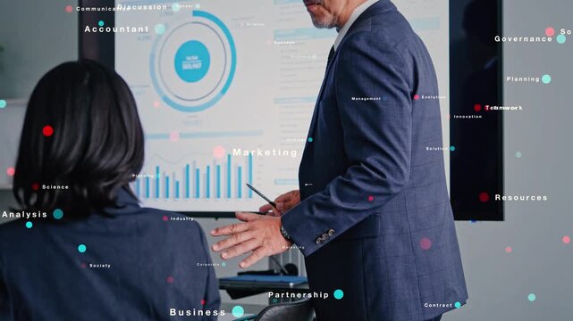 オフィスで会議するビジネスパーソンのグループとデジタルテクノロジーのコンセプト