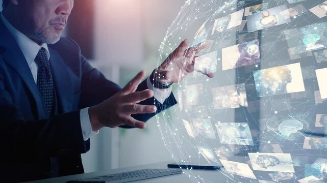 オフィスで作業する男性と映像テクノロジーのコンセプト