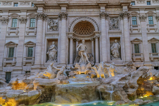 Trevi Fountain, the Baroque fountain in Rome, Italy, at dusk.