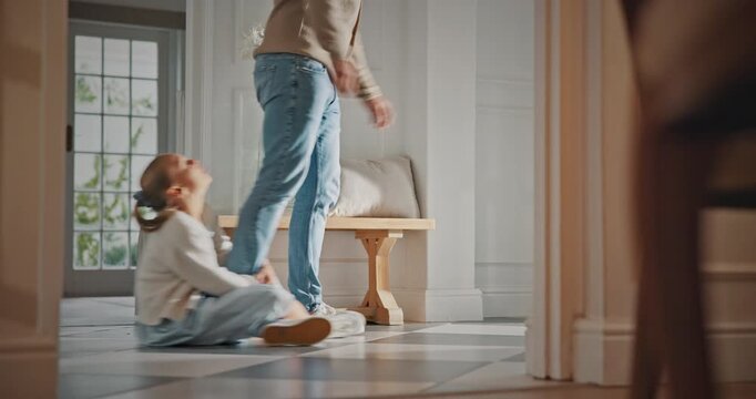 Legs, dad and kid with attachment in home for separation anxiety, dependence or sad for leaving. Clingy behavior, father and dragging child for physical connection, attention and fear of abandonment