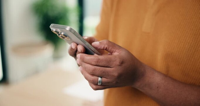 Man, hands and typing in house with phone, internet connection or network for text message response. Person, browsing and tech in living room with online chat, social media notification or mobile app