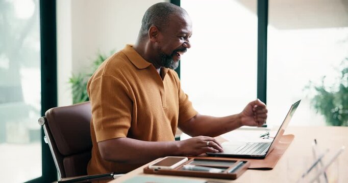 Black man, laptop and fist pump with success for remote work, editing article or creative in home. Project celebration, freelance writer and tech for approval with mature editor or story development