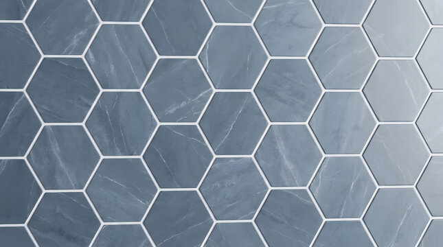 Hexagonal Tile Pattern: A close-up view of a modern hexagonal tile pattern with a subtle marble-like texture in shades of cool gray, perfect for interior design and architectural applications.