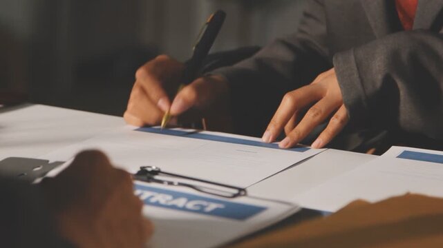 Lawyer explained to the client about the law that must be brought against the court case.Lawyer explained to the client about the law that must be brought against the court case.