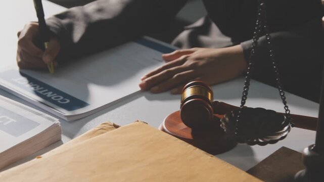 Lawyer explained to the client about the law that must be brought against the court case.Lawyer explained to the client about the law that must be brought against the court case.