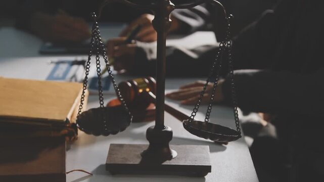 Lawyer explained to the client about the law that must be brought against the court case.Lawyer explained to the client about the law that must be brought against the court case.