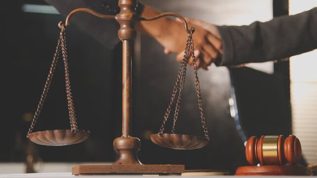 Lawyer explained to the client about the law that must be brought against the court case.Lawyer explained to the client about the law that must be brought against the court case.