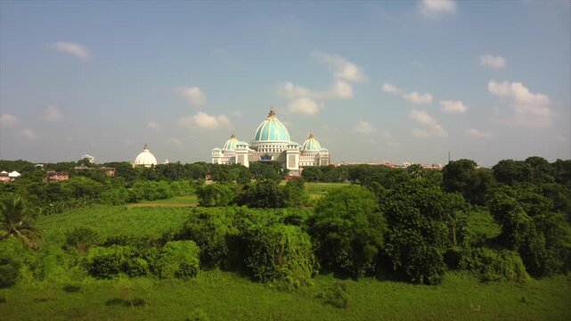 A drone flight over the forest towards the Vedic Planetarium