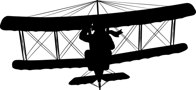 Silhouette of a vintage biplane flying directly forward with a pilot in cockpit