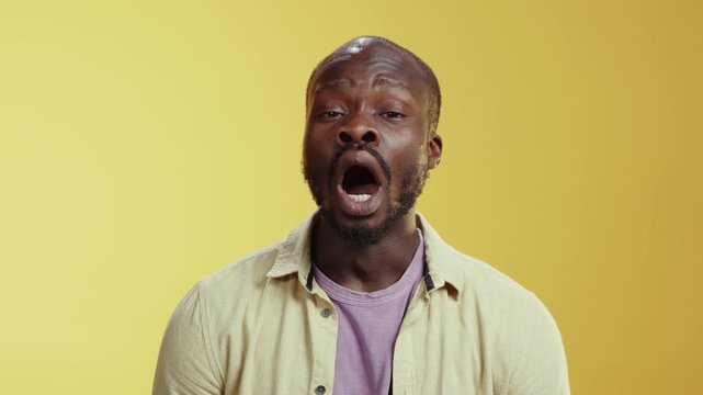 A bearded man humorously reacts to various scenarios in a video