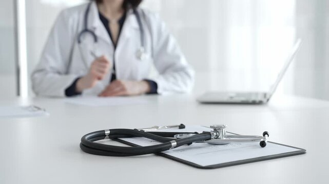 Stethoscope on clipboard, doctor working in office, preparing for patient examination, medical healthcare appointment. Medicine, healthcare and science concept