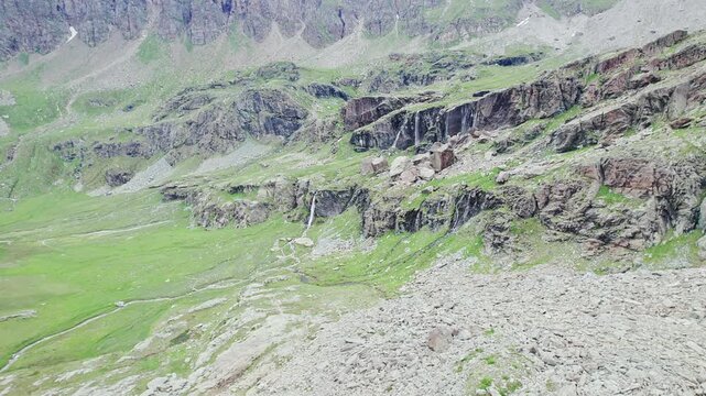 The mighty waterfalls of Piani di Fora in Valmalenco, Lombardy panorama in the summer season