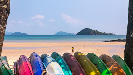 Colorful kayaks on the beach on the island of Ko Mak in Thailand © Foto-Jagla.de