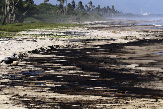Oil spill on beach in boca de aroa venezuela.