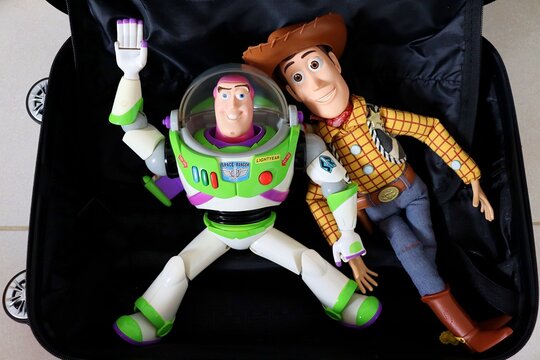 Salvador, Brazil - June 27, 2026. Luggage bag with Buzz Lightyear and Woody from Toy Story on it. Children's toys. Toy Story movie. 