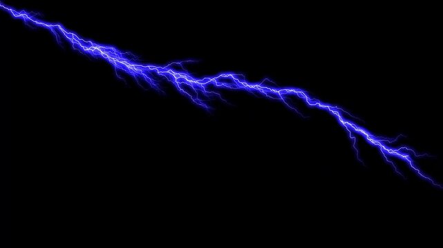 A powerful blue electric bolt strikes through the dark night sky during a dangerous nature storm as bright lightning flashes with the intense energy of a thunderbolt