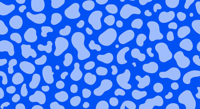 Bright blue cow print seamless pattern background. Retro dalmatian spotted animal skin vector texture for wallpaper.
