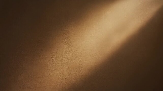 Abstract cinematic warm light beam on textured bronze background for product stage backdrop and luxury atmosphere