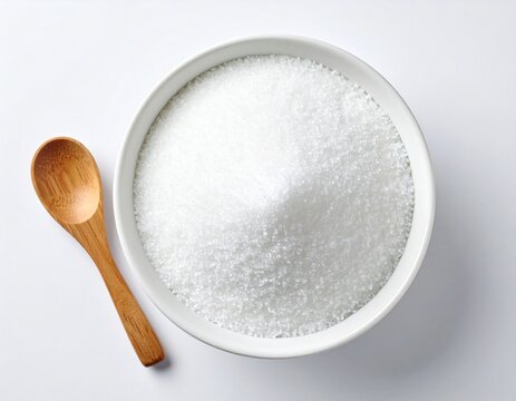 A bowl of sugar with a wooden spoon, a close-up overhead shot