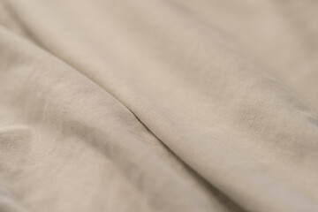 Fototapeta premium Closeup of beige french terry fabric for hoodies and similar clothes
