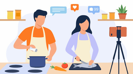Fototapeta premium Couple cooking and live streaming online culinary show for social media