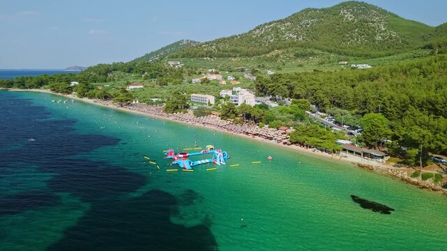 Crowded Sandy Shore of Paralia Pachi Beach, Thasos, Greece