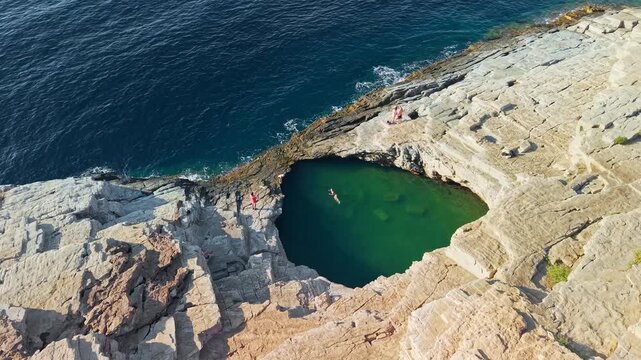 Woman Swimming in Giola Natural Sea Lagoon, Thasos