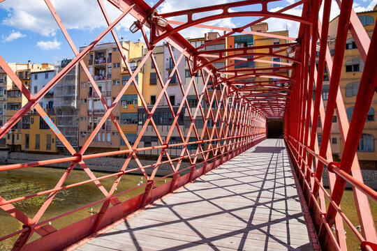 red iron eiffel bridge in girona view from inside the structure, Girona Spain