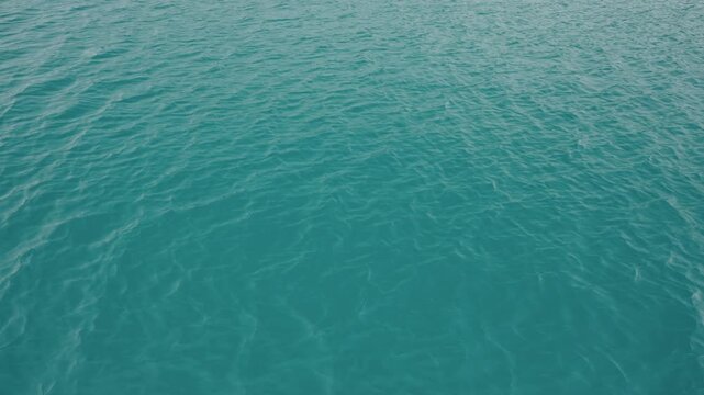 Slow motion closeup shot of ocean water surface