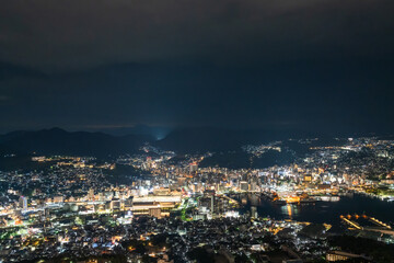 Obraz premium Panoramic night view of Nagasaki Bay from Mount Inasa