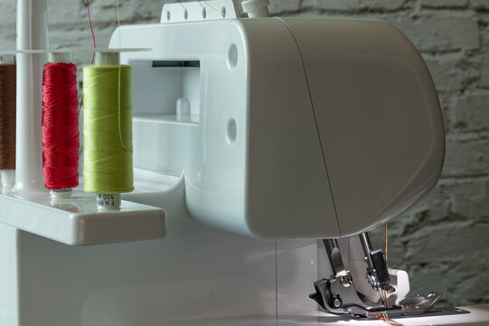 Overlock sewing machine, rear view with spool holder