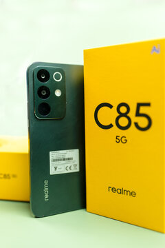 Bangkok, Thailand - March 31, 2026 : Realme C85 5G, Parrot Purple. Processor MediaTek Dimensity 6300. Peacock Green