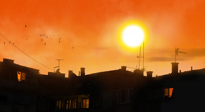 sun in scorching summer day in heat wave, hot weather in city