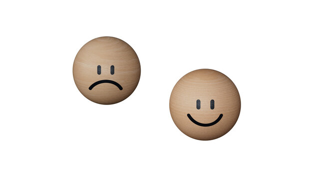 Close up customer choose smiley face and blurred sad face icon on wood BALL, Service rating, satisfaction concept.Supports PNG files with transparent backgrounds.